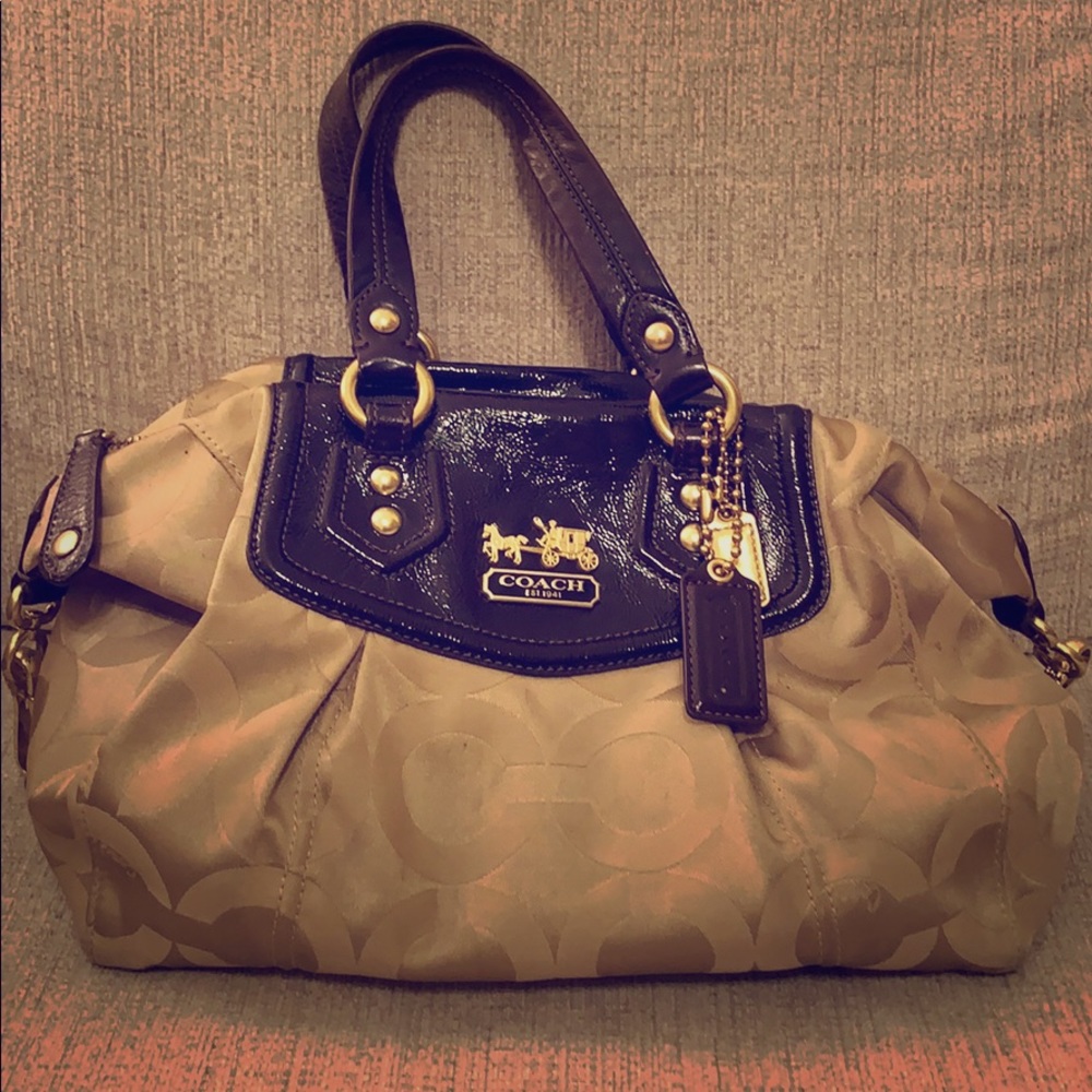 Coach Barrel Bag in classic Coach symbol print